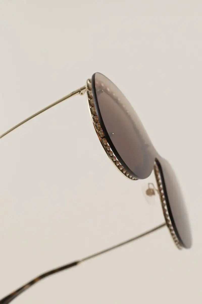 Lunettes de protection Chanel Doré en Plastique