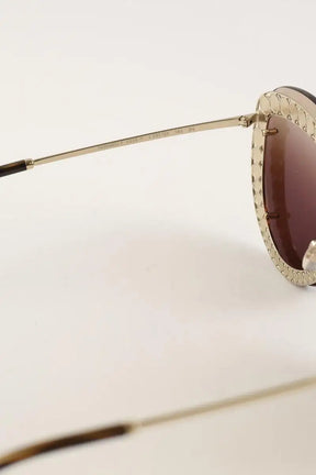Lunettes de protection Chanel Doré en Plastique