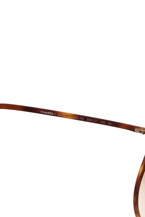 Lunettes de soleil Chanel Marron en Plastique