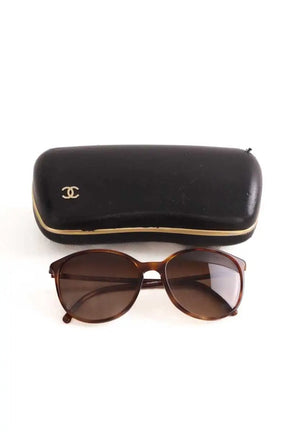 Lunettes de soleil Chanel Marron en Plastique