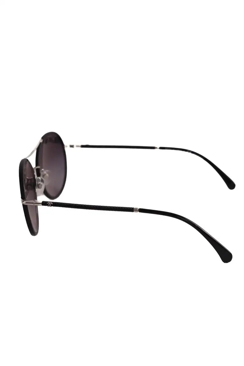 Lunettes de soleil Chanel Noir en Métal