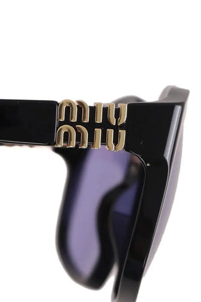 Lunettes de soleil Miu Miu Bleu en Plastique