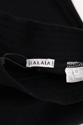 Mini jupe Alaïa Noir en Laine