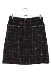 Mini jupe Chanel Noir en Tweed, taille M - Seconde Main
