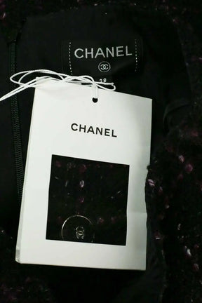 Mini jupe Chanel Noir en Tweed