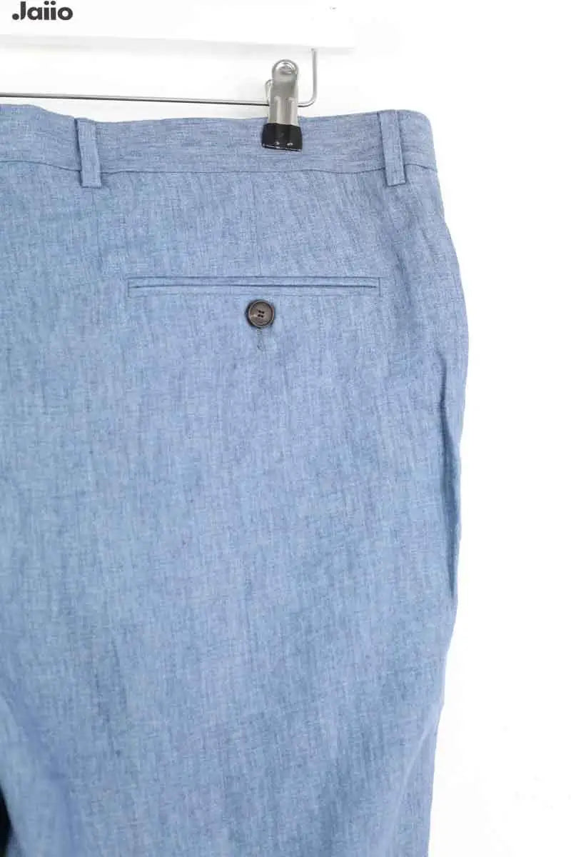 Pantalon de costume Sandro Bleu en Lin
