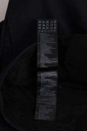 Pantalon de costume Sandro Marine en Synthétique