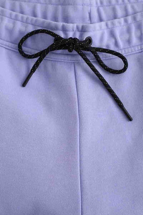 Pantalon de sport Nike Violet en Coton