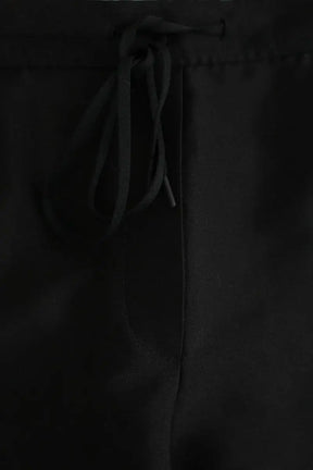 Pantalon Sandro Noir en Polyester