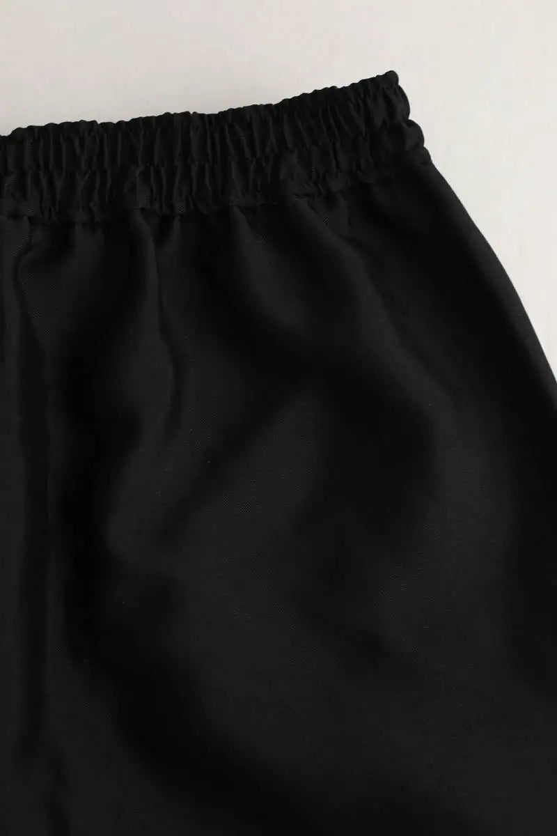 Pantalon Sandro Noir en Polyester