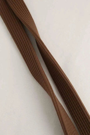 Pochette de téléphone Issey Miyake Marron en Synthétique