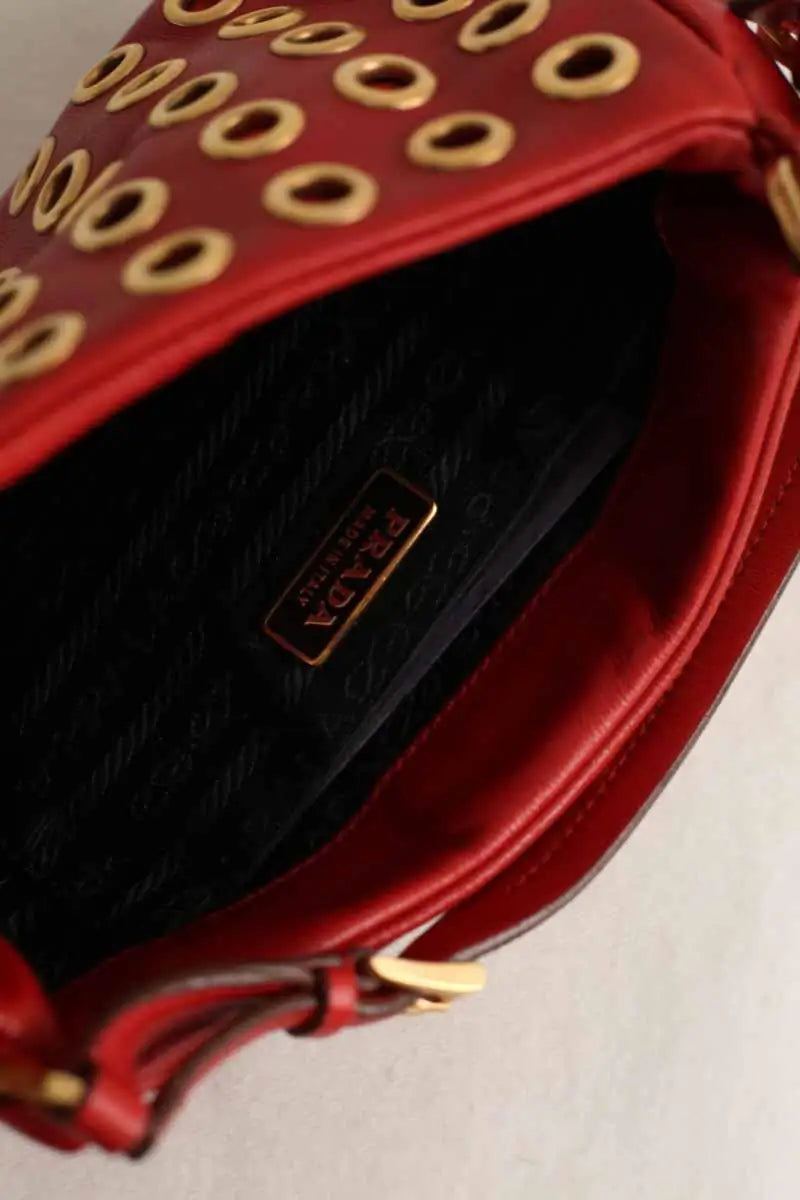 Pochette Prada Nappa grommet Rouge en Cuir