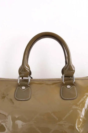 Sac à main Longchamp Paris boston coloris taupe imprimé sigle longchamps monochrome Kaki en Cuir verni