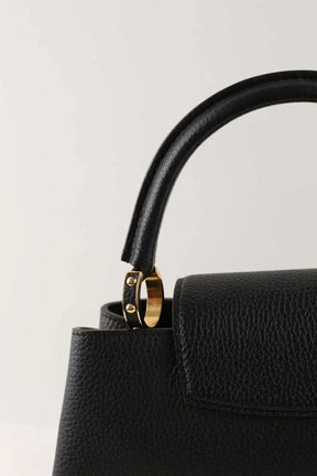 Sac à main Louis Vuitton Capucines Noir en Cuir