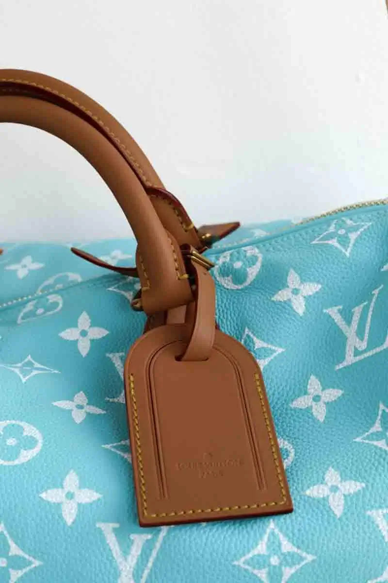 Sac de voyage Louis Vuitton Speedy P9 bandoulière 40 Bleu en Cuir