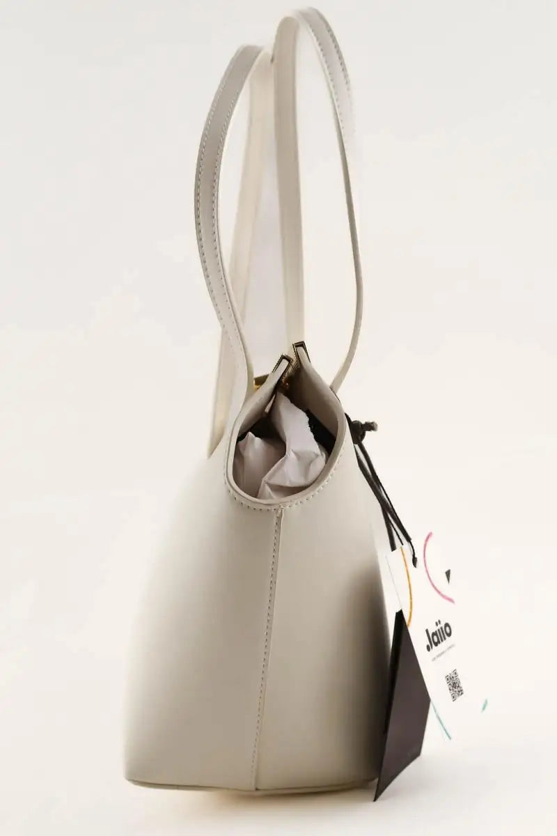 Sac porté épaule Kassandre Eileen asymétrique Ecru en Cuir