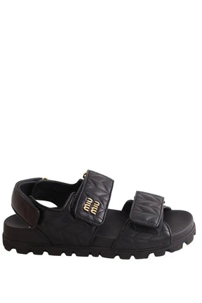 Sandales Miu Miu Sandales sportives en cuir nappa matelassé Noir en Cuir, taille 39 - Seconde Main