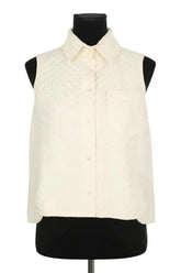 Top sans manche Dior Ecru en Synthétique, taille S - Seconde Main