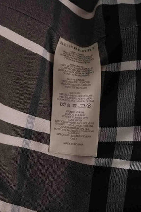 Trench-coat Burberry Noir en Coton