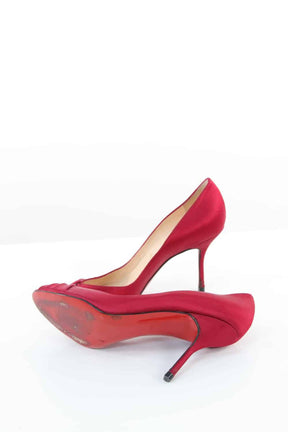  Christian Louboutin  Rouge