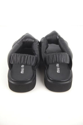 Mules Miu Miu  Noir