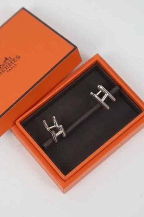 Bouton de manchette Hermès  Argent